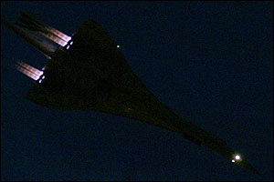 Concorde over Heathrow airport at night, October 2003, by Harm Rutten from the Netherlands