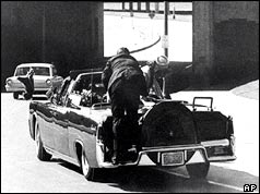 President Kennedy's car speeds away after the shots had been fired