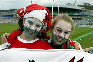 Wales fans pose for a photo ahead of the game