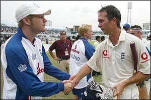 Matthewq Hoggard shakes the hand of Michael Vaughan as England complete their win