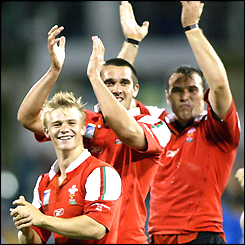 Dwayne Peel, Jonathan Thomas and Robert Sidoli savour their support after the final whistle