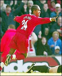 Florent Sinama-Pongolle celebrates scoring his first-ever Liverpool goal