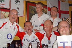  England fans celebrate their win over the Springboks