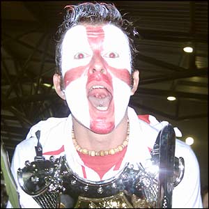 An England fan watches as they play South Africa