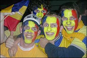 Romania fans cheer on their team against Argentina