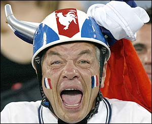A France fan shouts prior to kick-off against New Zealand