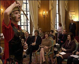 Mrs Bush and Mrs Blair watch a performance of Shakespeare by schoolchildren