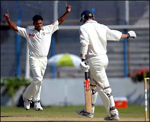 Bangladesh's Mashrafe Mortaza celebrates after England's Rikki Clarke is dismissed