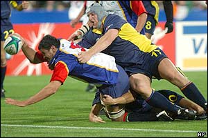 Namibian lock Eben Isaacs forces his way over in the 56th minute