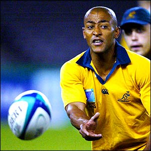 George Gregan offloads a pass during the Australian team's captain's run at the Telstra Dome in Melbourne