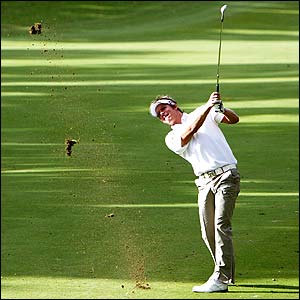Fredrik Jacobson of Sweden hits his second shot on the 18th hole during the first round of the Volvo Masters at Valderrama in Spain