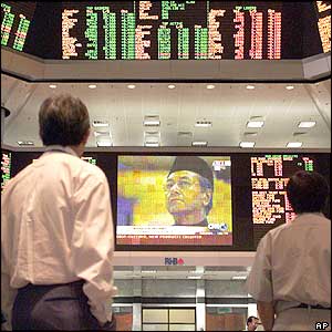 Stock trader watching TV