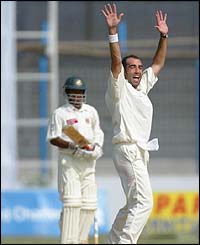 England's Richard Johnson celebrates removing Hannan Sarkar 