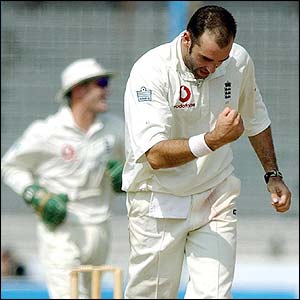 England's Richard Johnson celebrates claiming the wicket of Khaled Mahmud