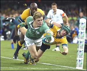 Ireland centre Brian O'Driscoll touches down in the corner for Ireland's first try