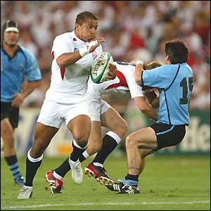Jason Robinson races clear of the Uruguay defence
