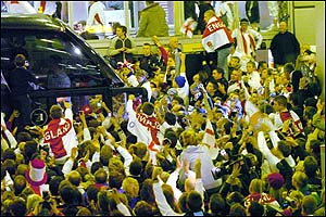 England fans mob the team bus