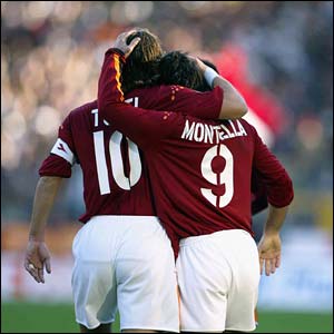 Roma's Francesco Totti and Vincenzo Montella celebrate a goal
