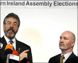Sinn Fein President Gerry Adams (left) with the party's successful South Belfast candidate Alex Maskey 