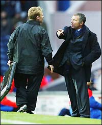 Blackburn boss Graeme Souness argues with the fourth official