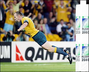 Australia's Stirling Mortlock scores the first try