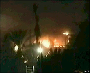 Arabic television station al-Arabiya shows buildings burning 