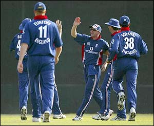 Paul Collingwood celebrates claiming a catch