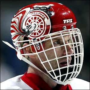 Detroit Red Wings goalkeeper Dominik Hasek watches his team in action