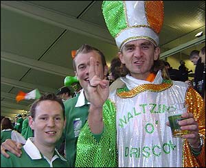 Irish supporters in action against Romania