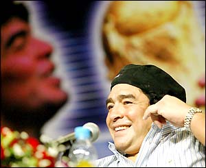 Diego Maradona gives a speech in Beijing during a promotional tour of China