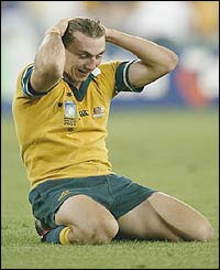 Australia's Mat Rogers celebrates victory