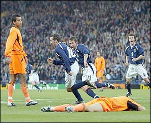 James McFadden runs off after scoring against Holland