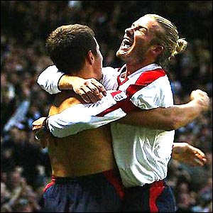 David Beckham and Joe Cole celebrate England's second goal