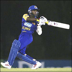 Romesh Kaluwitharana pulls the ball away