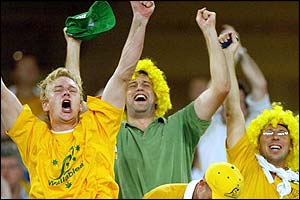 Australian fans celebrate in the Telstra stadium