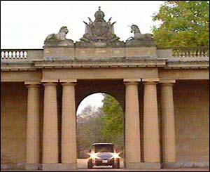 President Bush arrives in his heavily-armoured Cadillac deVille