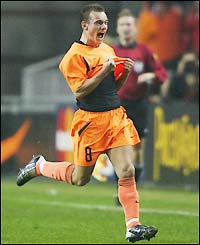 Wesley Sneijder scores the first goal for Holland
