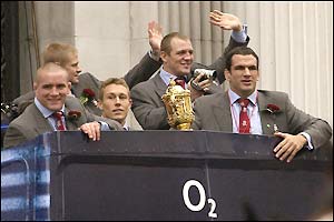 Martin Johnson and his team set off on their victory parade