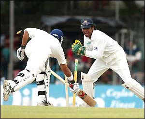 Shortly after the break Dharmasena stumps out Butcher