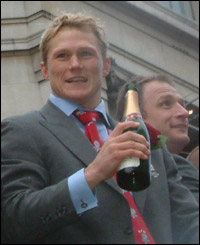 Josh Lewsey is snapped taking a sip of champagne