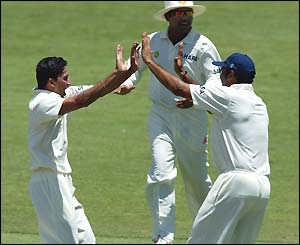 Paceman Ajit Agarkar celebrates his six-wicket haul in the second innings