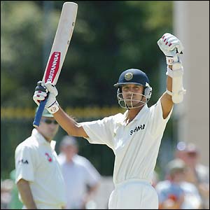 Rahul Dravid raises his bat to the crowd on reaching his double century