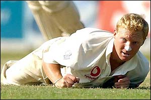 England's Gareth Batty watches the ball fly past