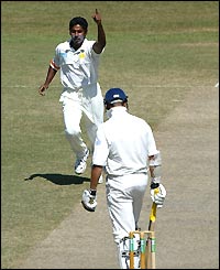 Chaminda Vaas celebrates taking the wicket of England opener Marcus Trescothick