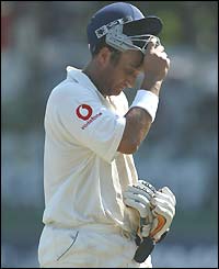 Mark Butcher leaves the field after becoming the sixth England batsman out