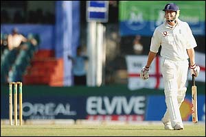 Andrew Flintoff leaves the pitch after being caught behind off Dilhara Fernando