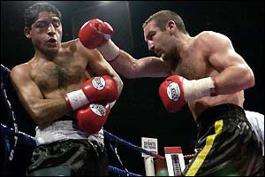 Harrison beats Julio Pablo Chacon of Argentina to become world champion