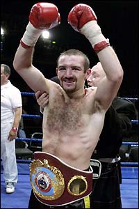 Harrison savours the feeling of being crowned WBO featherweight champion after the win over Chacon