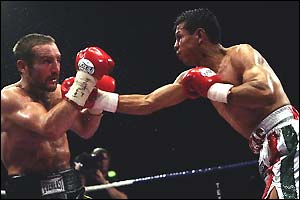 Manuel Medina beat Harrison to claim a record fourth world title