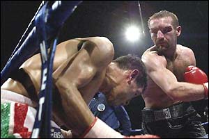 Harrison lands one of several terrific blows that finally stopped the courageous Medina